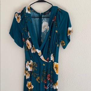 Floral spring romper, low cut, long legged.